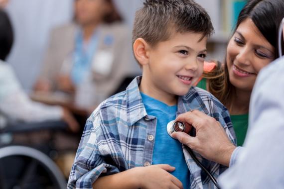 pediatrician-examines-young-male-hispanic-patient-picture-id637014338_2.jpg