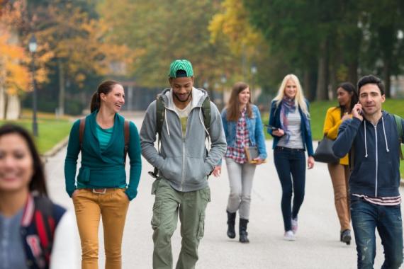 students-walking-through-the-park-picture-id858079810.jpg