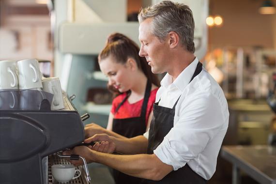 teenage_worker_barista_being_trained.jpg