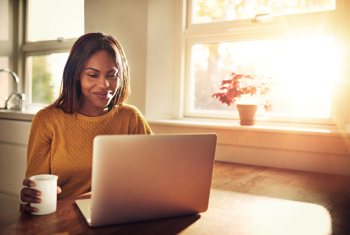 Woman looking at laptop